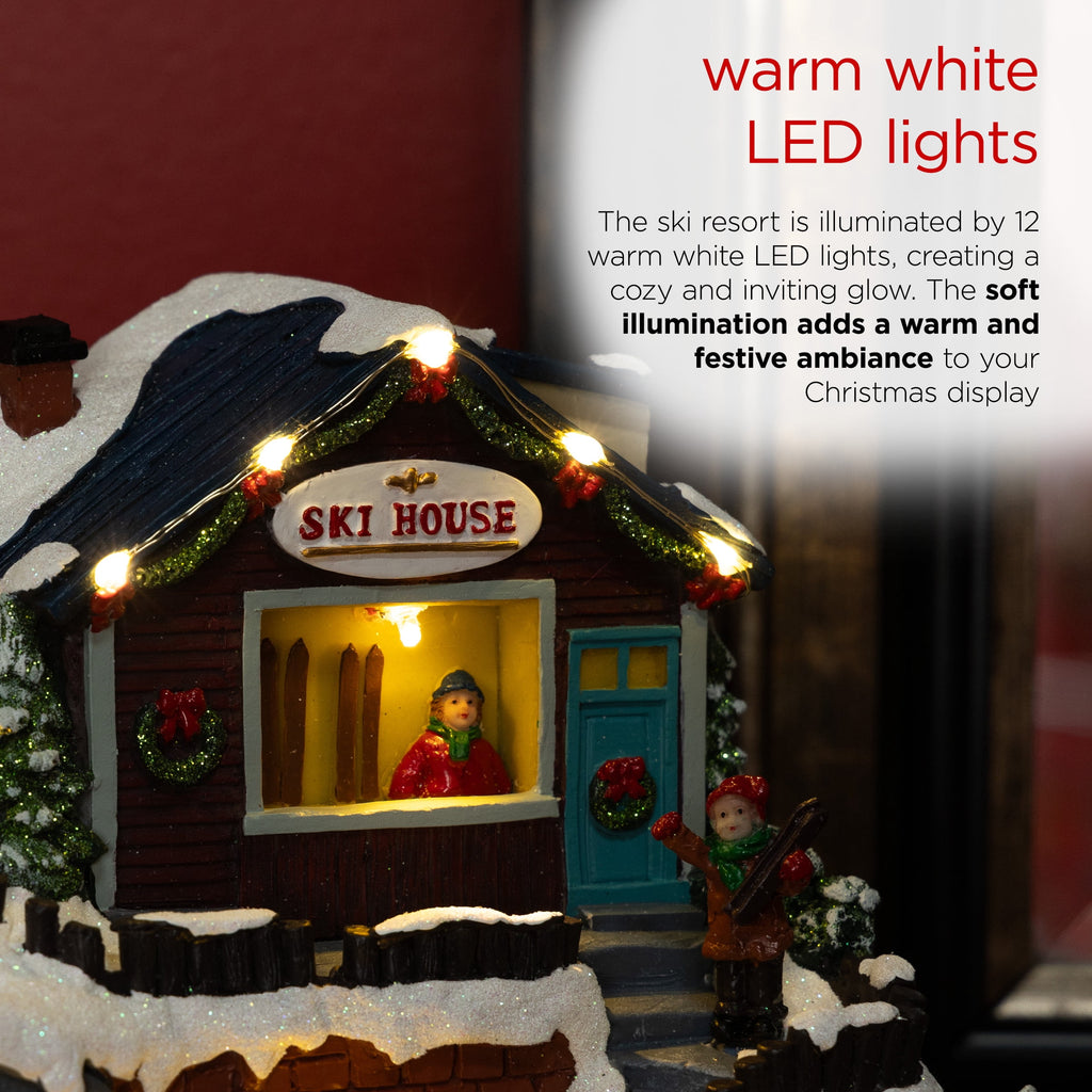 Alpine Corporation Animated Children Playing in Christmas Village Holiday Tabletop Decor with 26 Multicolor LED Lights and 5.9' Cord, 17" L x 11" W x 9" H
