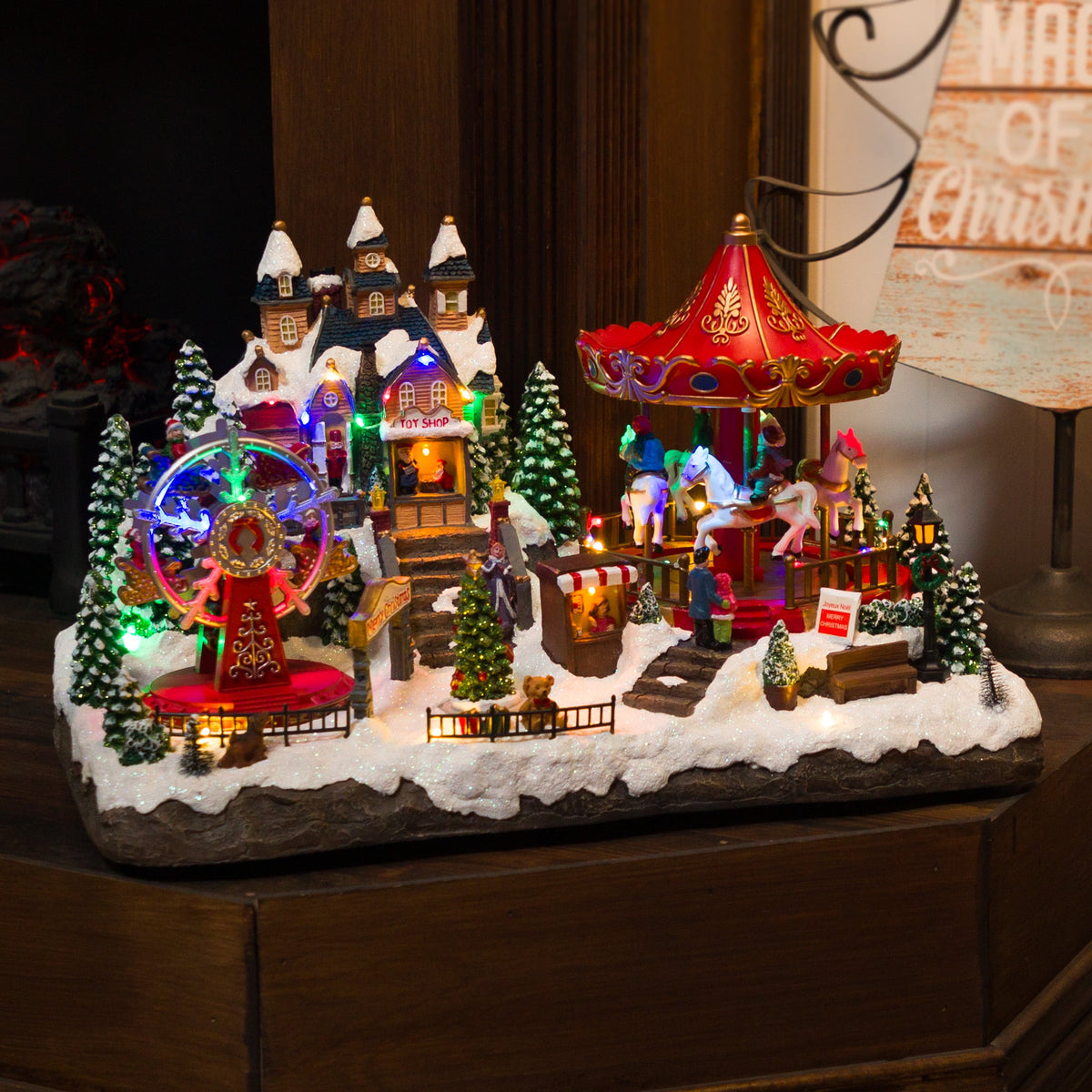 Alpine Corporation Animated Children Playing in Christmas Village Holiday Tabletop Decor with 26 Multicolor LED Lights and 5.9' Cord, 17" L x 11" W x 9" H