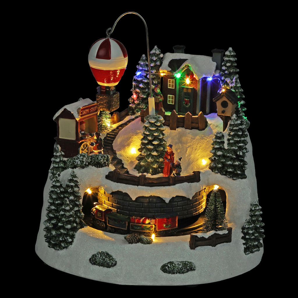 Alpine Corporation Animated Children Playing in Christmas Village Holiday Tabletop Decor with 26 Multicolor LED Lights and 5.9' Cord, 17" L x 11" W x 9" H