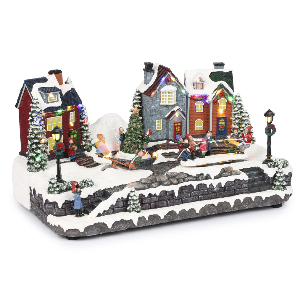 Alpine Corporation Animated Children Playing in Christmas Village Holiday Tabletop Decor with 26 Multicolor LED Lights and 5.9' Cord, 17" L x 11" W x 9" H