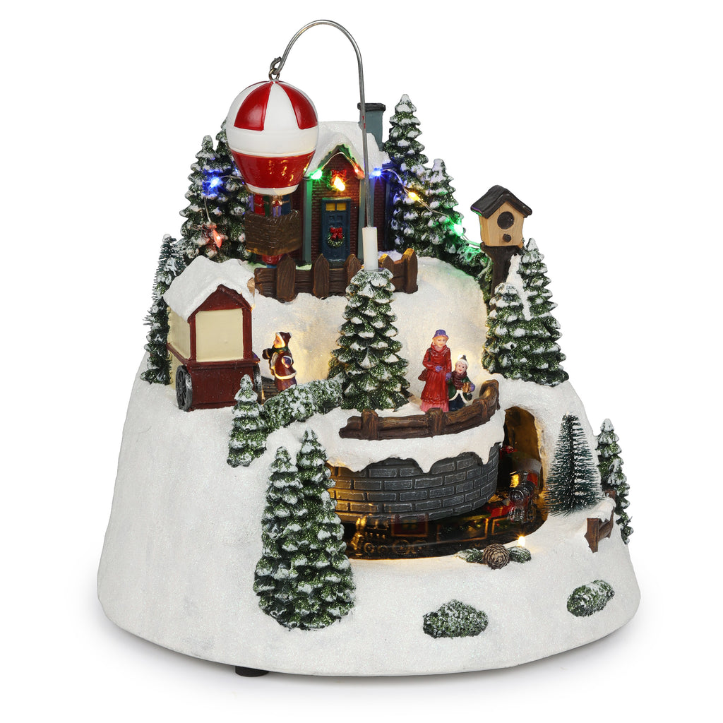 Alpine Corporation Animated Children Playing in Christmas Village Holiday Tabletop Decor with 26 Multicolor LED Lights and 5.9' Cord, 17" L x 11" W x 9" H