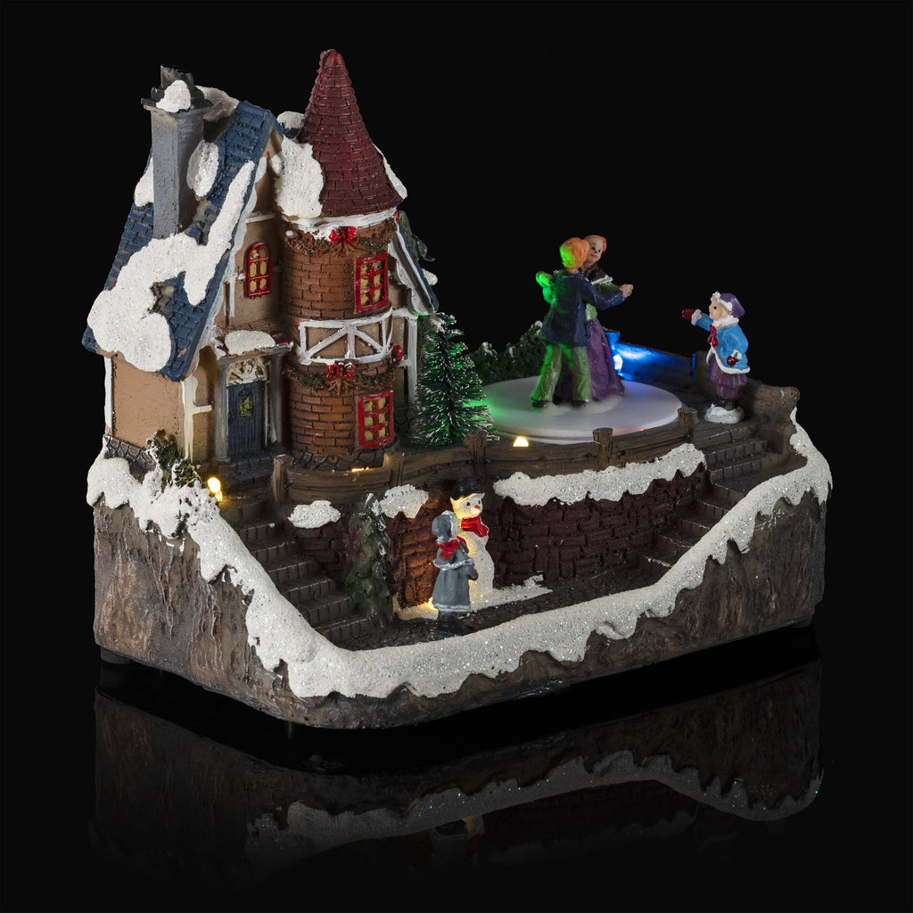 Alpine Corporation Animated Children Playing in Christmas Village Holiday Tabletop Decor with 26 Multicolor LED Lights and 5.9' Cord, 17" L x 11" W x 9" H