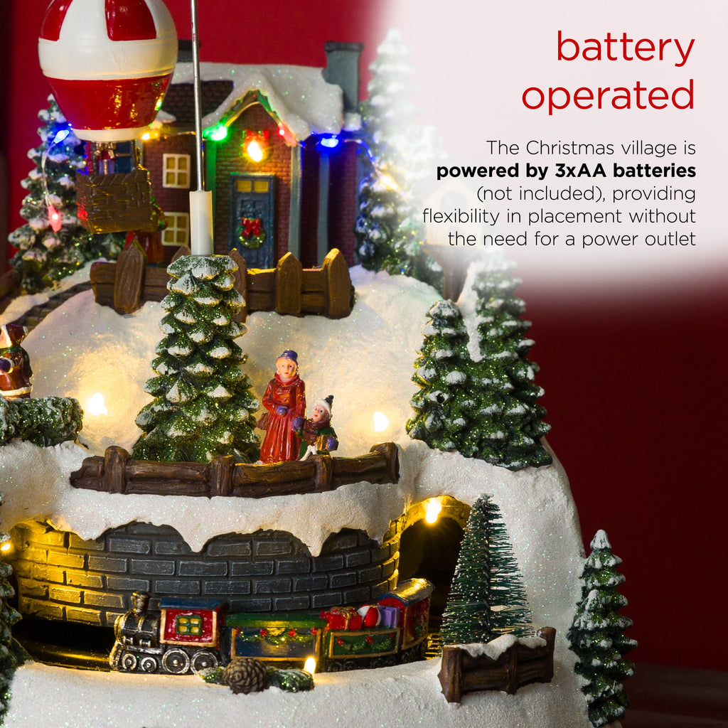 Alpine Corporation Animated Children Playing in Christmas Village Holiday Tabletop Decor with 26 Multicolor LED Lights and 5.9' Cord, 17" L x 11" W x 9" H