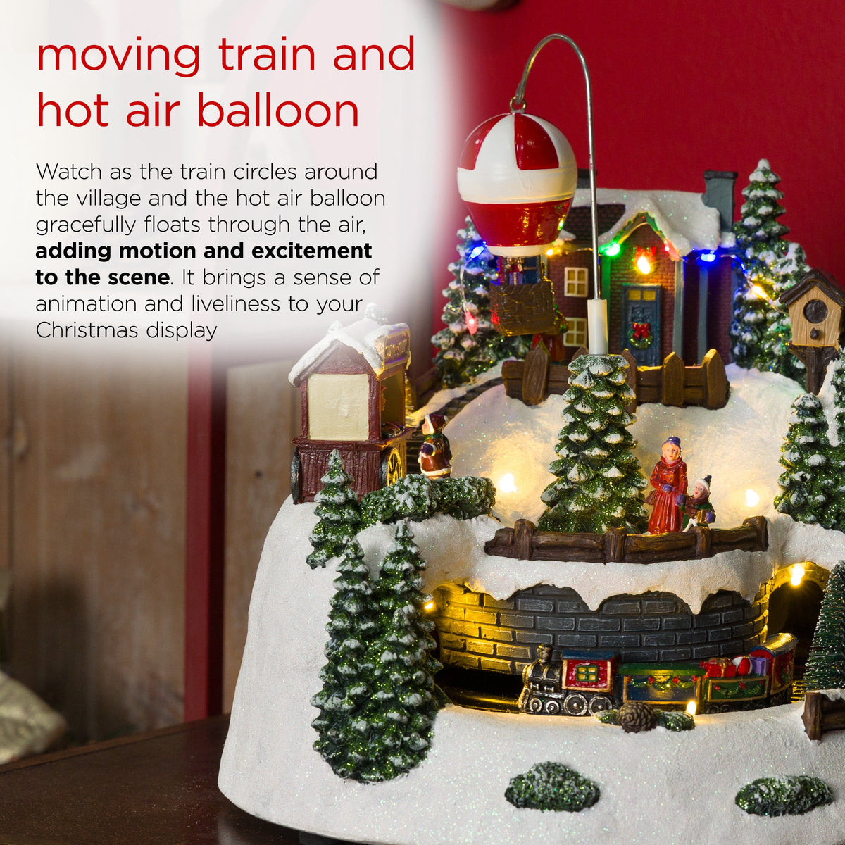 Alpine Corporation Animated Children Playing in Christmas Village Holiday Tabletop Decor with 26 Multicolor LED Lights and 5.9' Cord, 17" L x 11" W x 9" H