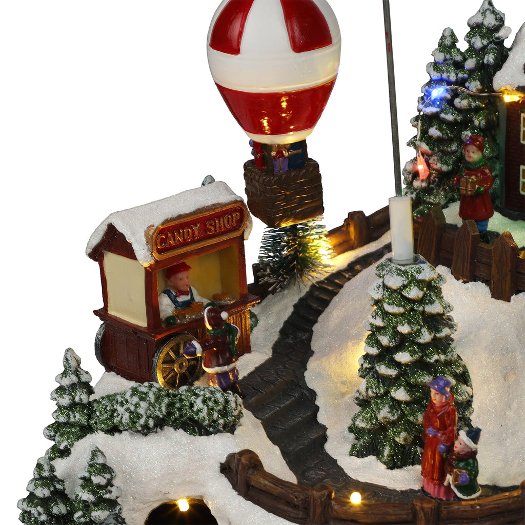 Alpine Corporation Animated Children Playing in Christmas Village Holiday Tabletop Decor with 26 Multicolor LED Lights and 5.9' Cord, 17" L x 11" W x 9" H