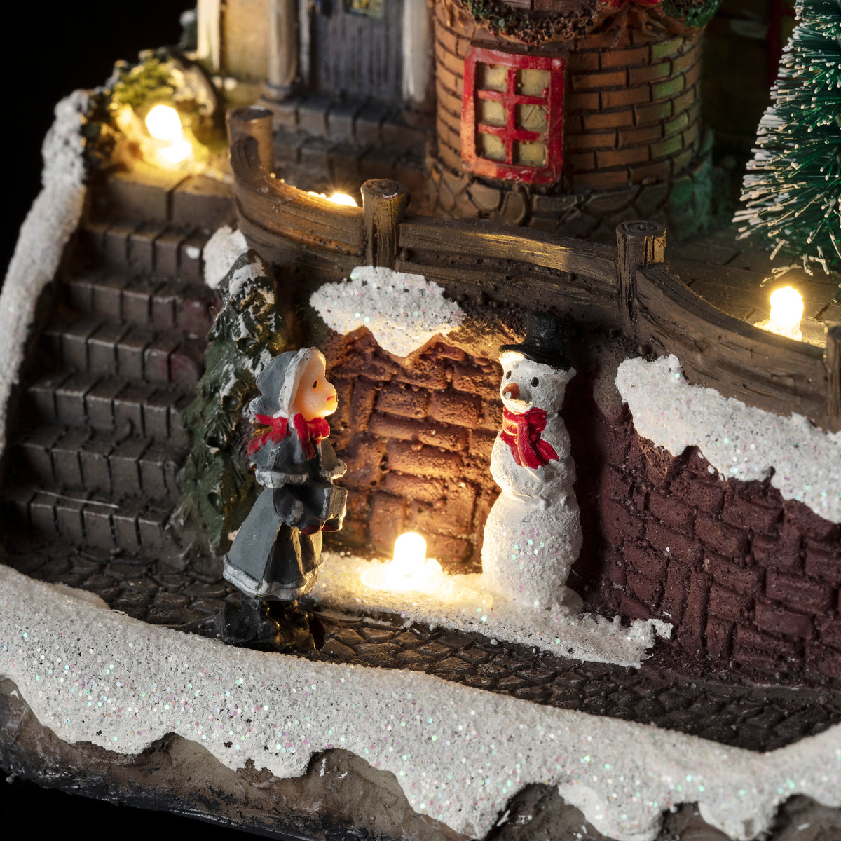 Alpine Corporation Animated Children Playing in Christmas Village Holiday Tabletop Decor with 26 Multicolor LED Lights and 5.9' Cord, 17" L x 11" W x 9" H